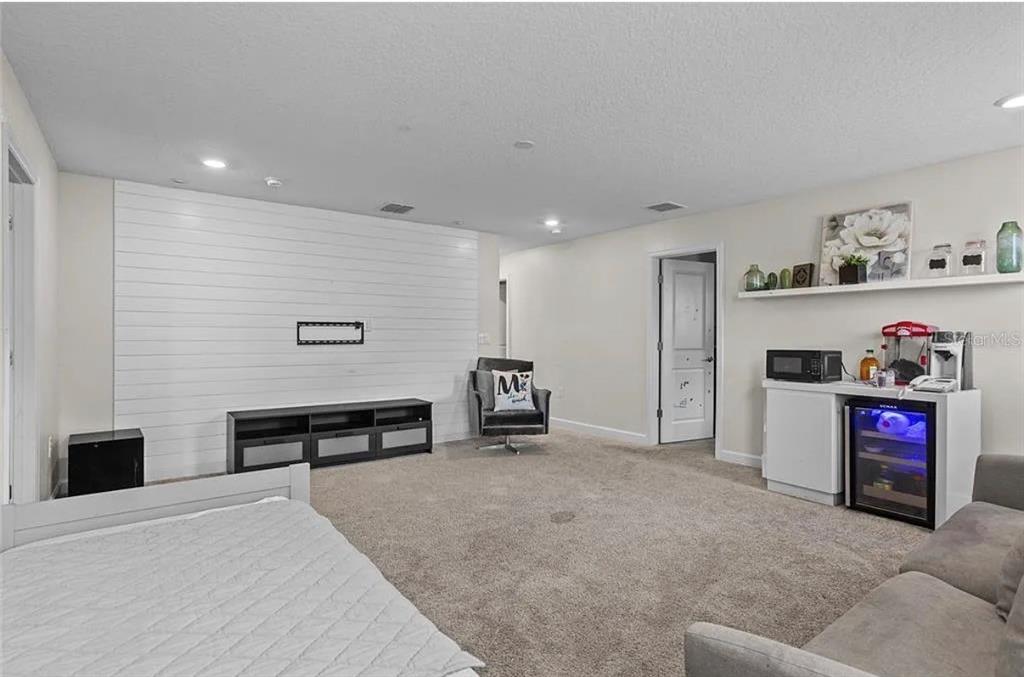 4585 Target Boulevard Kissimmee, FL 34746 - Photo 16 of 24 a living room with furniture