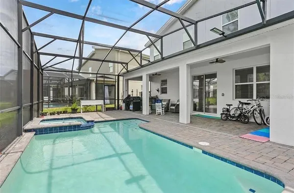 a view of yard with patio