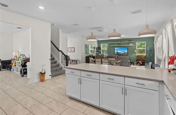 a bathroom with a sink a mirror and vanity