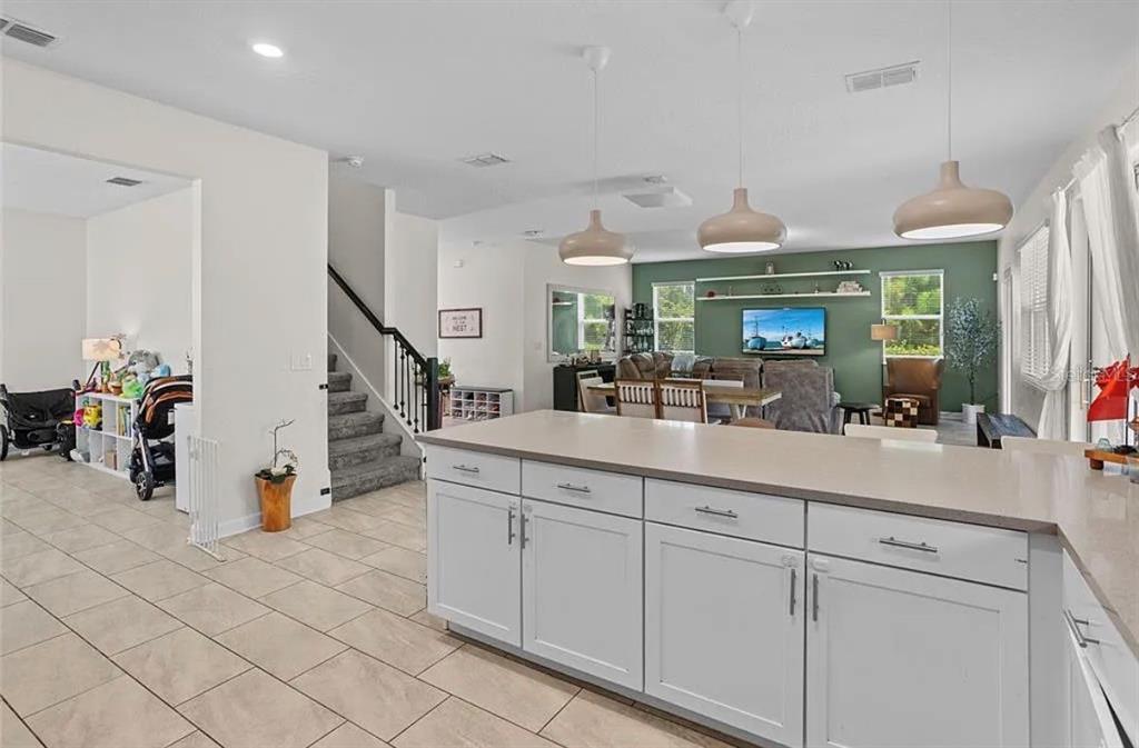 4585 Target Boulevard Kissimmee, FL 34746 - Photo 9 of 24 a bathroom with a sink a mirror and vanity