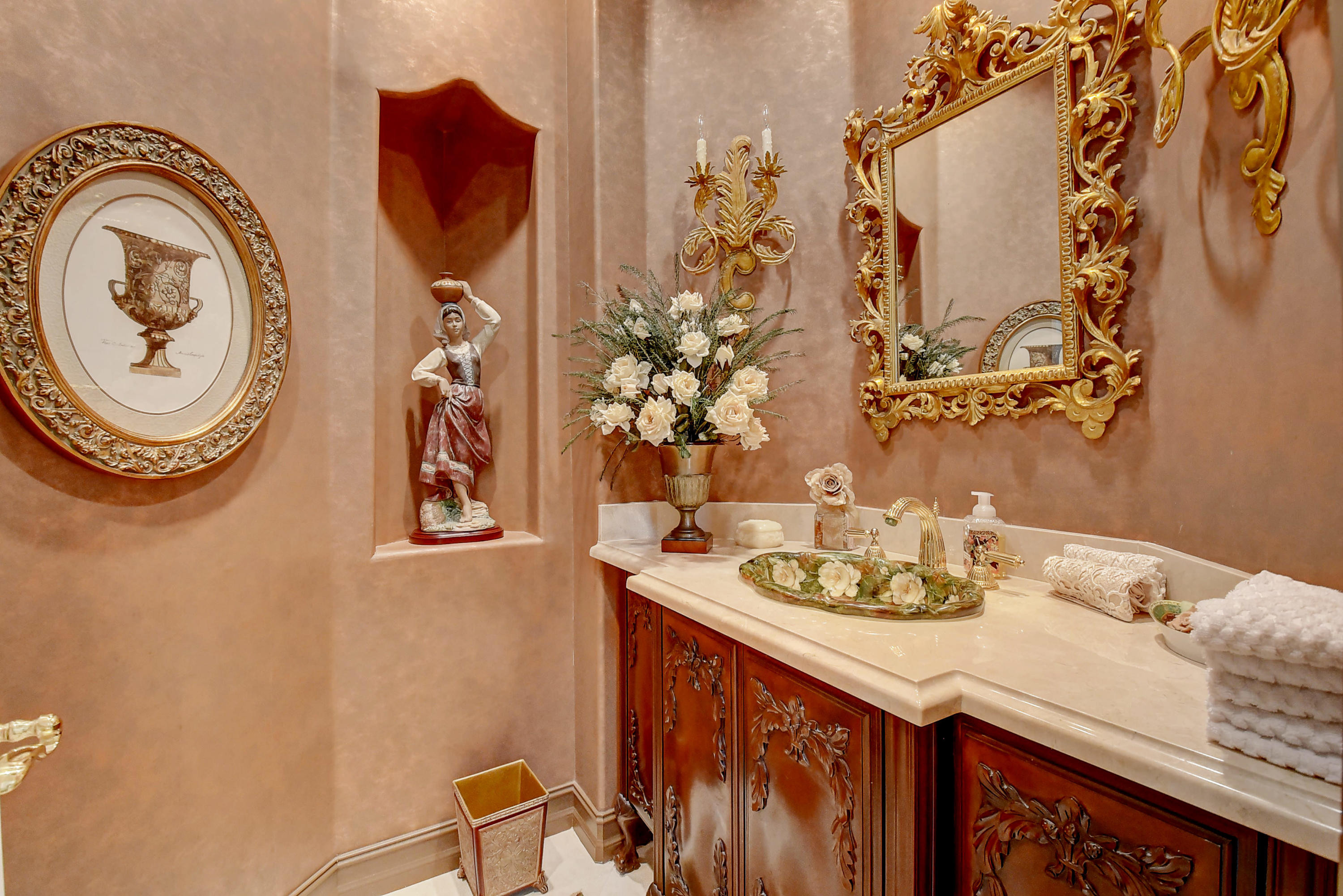 3811 Northwest Coventry Lane Boca Raton, FL 33496 - Photo 22 of 52 a bathroom with a sink and a mirror