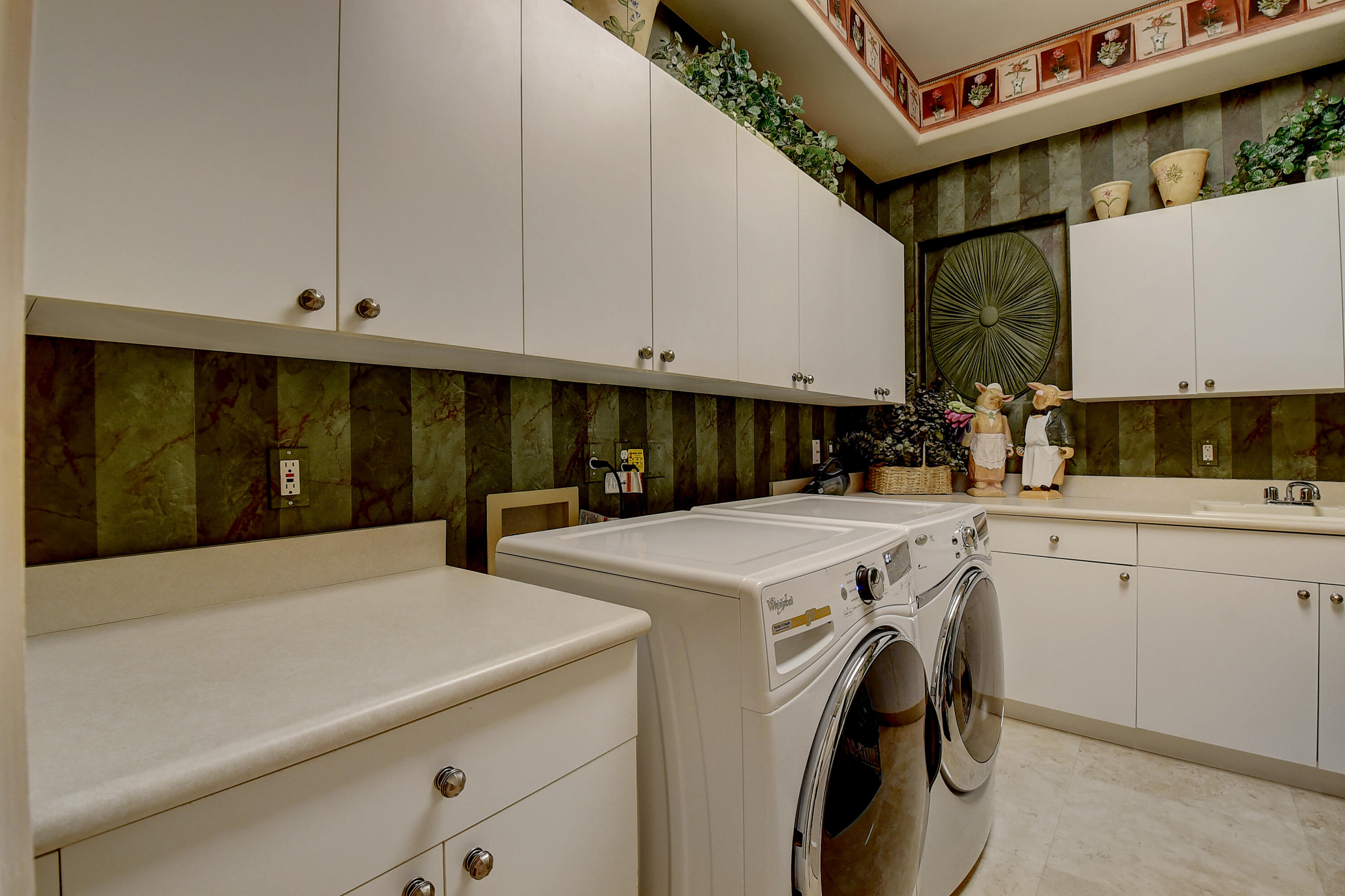 3811 Northwest Coventry Lane Boca Raton, FL 33496 - Photo 25 of 52 a utility room with dryer and washer