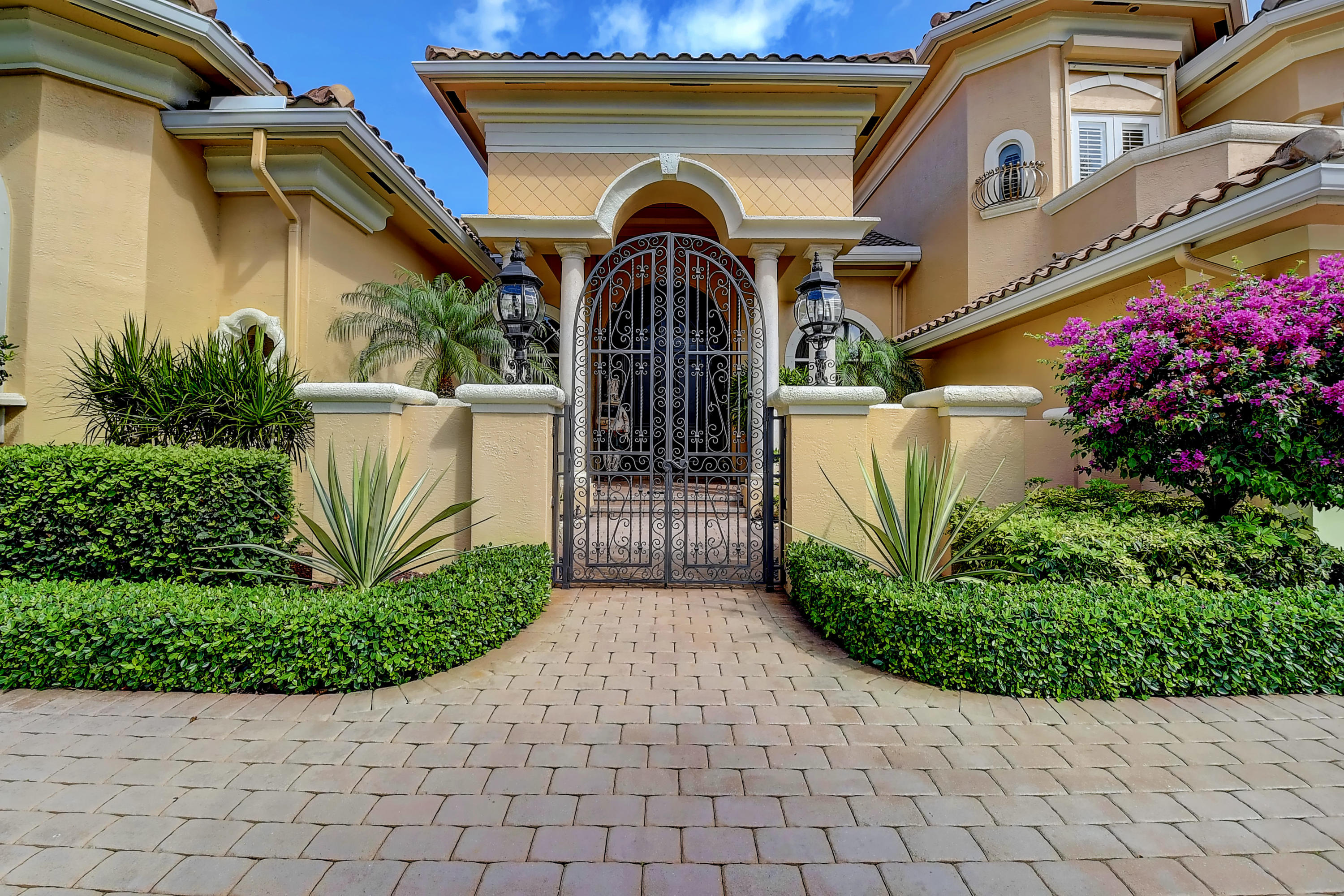 3811 Northwest Coventry Lane Boca Raton, FL 33496 - Photo 3 of 52 a view of a house with a small yard and plants
