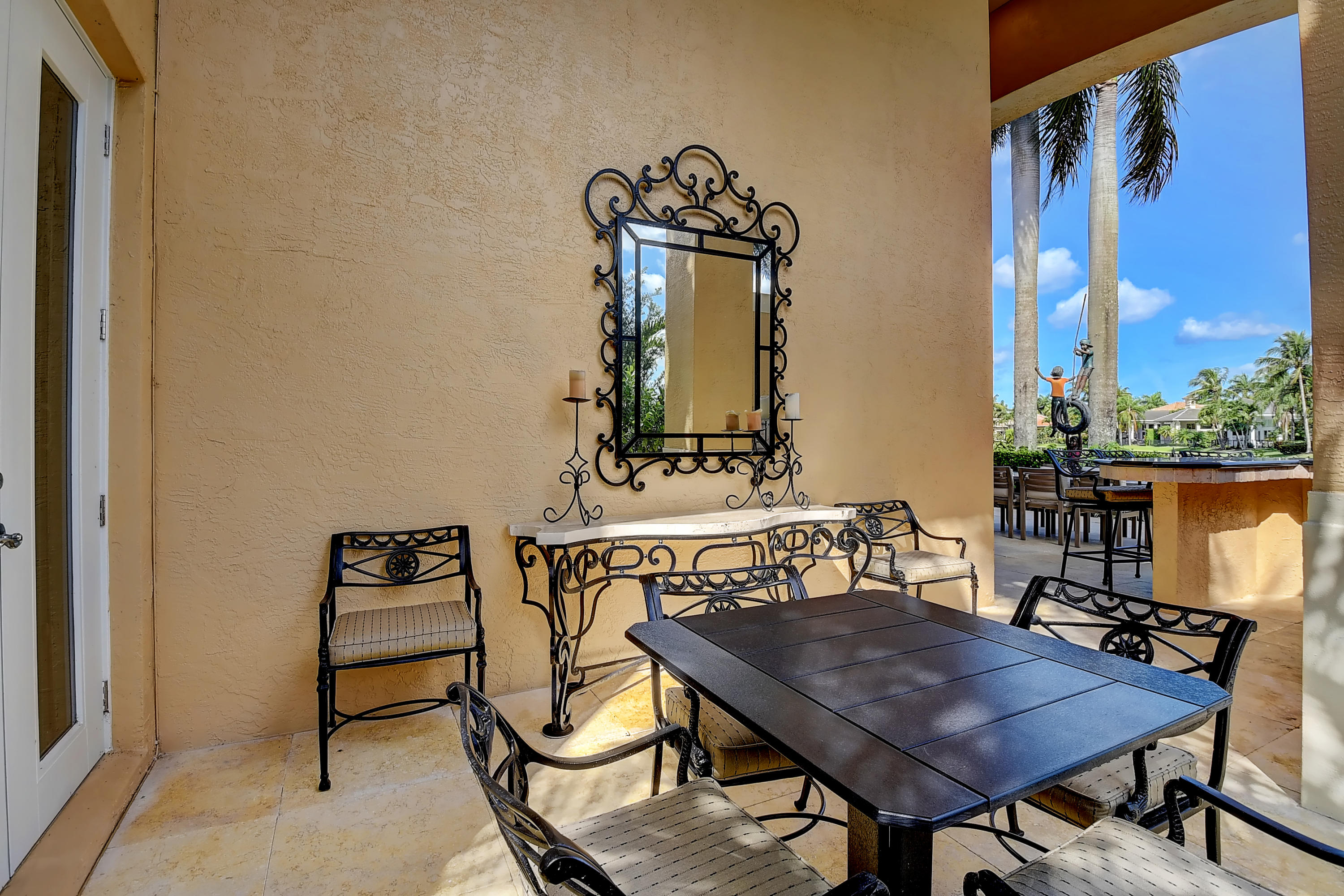3811 Northwest Coventry Lane Boca Raton, FL 33496 - Photo 32 of 52 a view of a dining room with furniture and a window