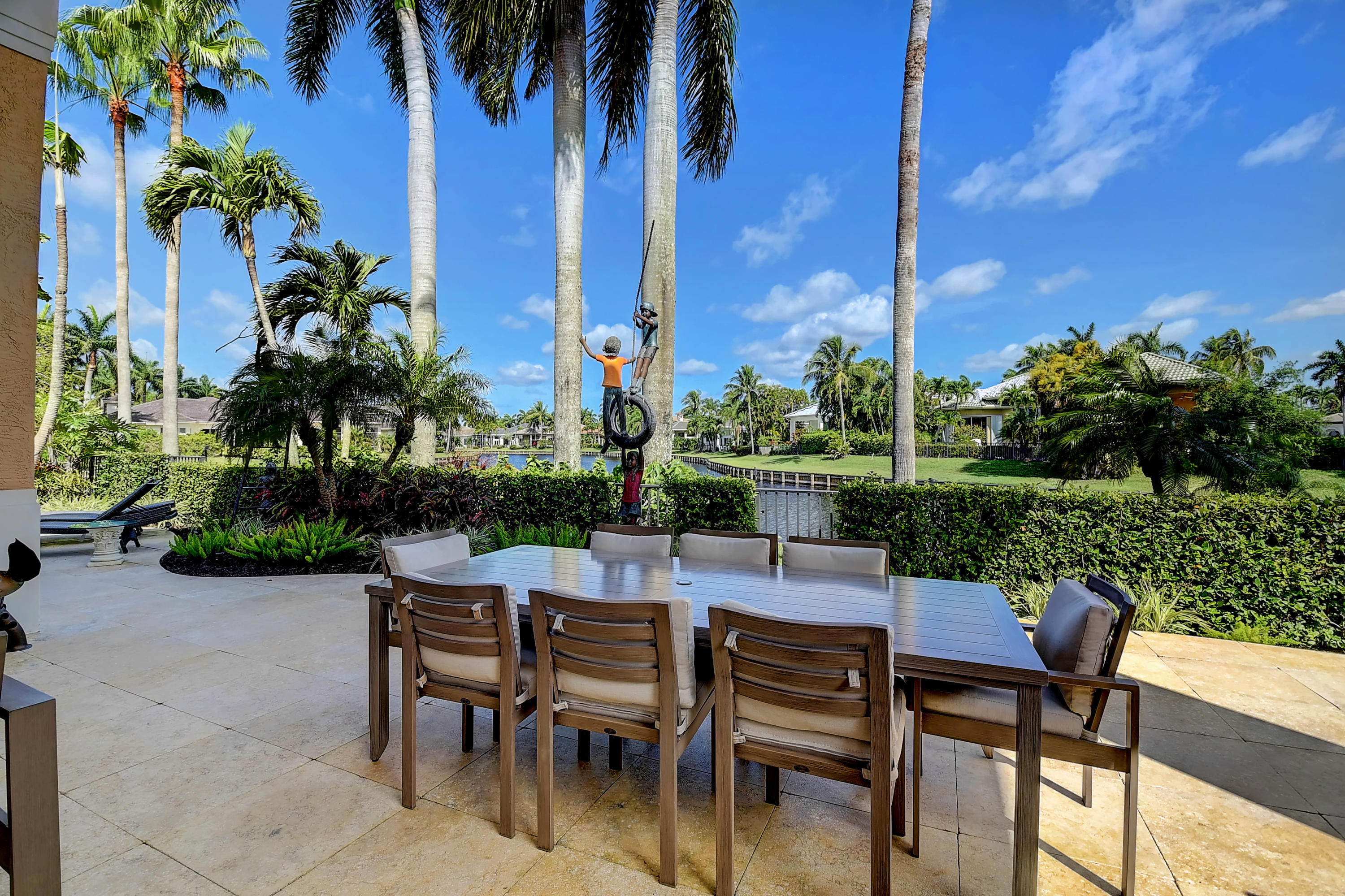 3811 Northwest Coventry Lane Boca Raton, FL 33496 - Photo 34 of 52 a view of an outdoor space with a patio