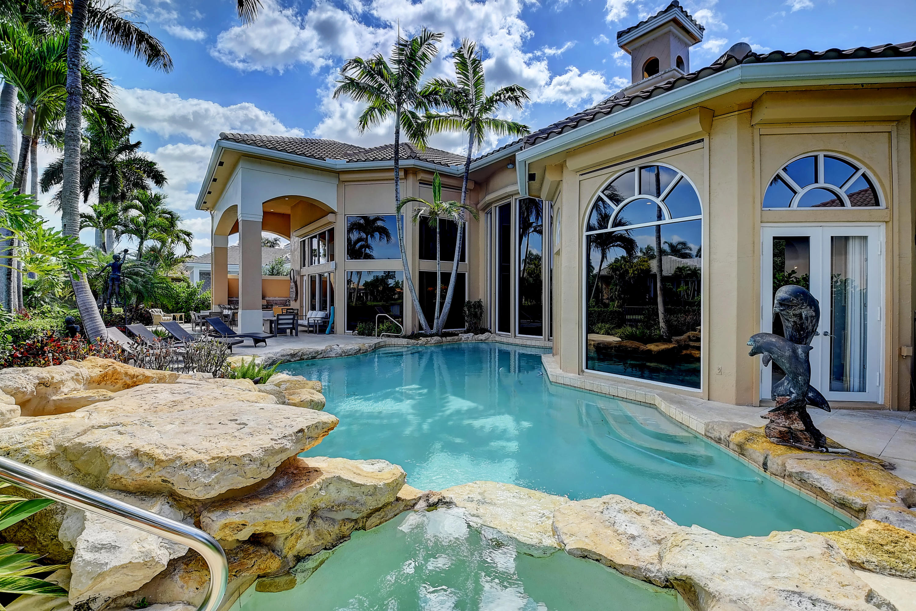 3811 Northwest Coventry Lane Boca Raton, FL 33496 - Photo 39 of 52 a view of a dinning area with swimming pool