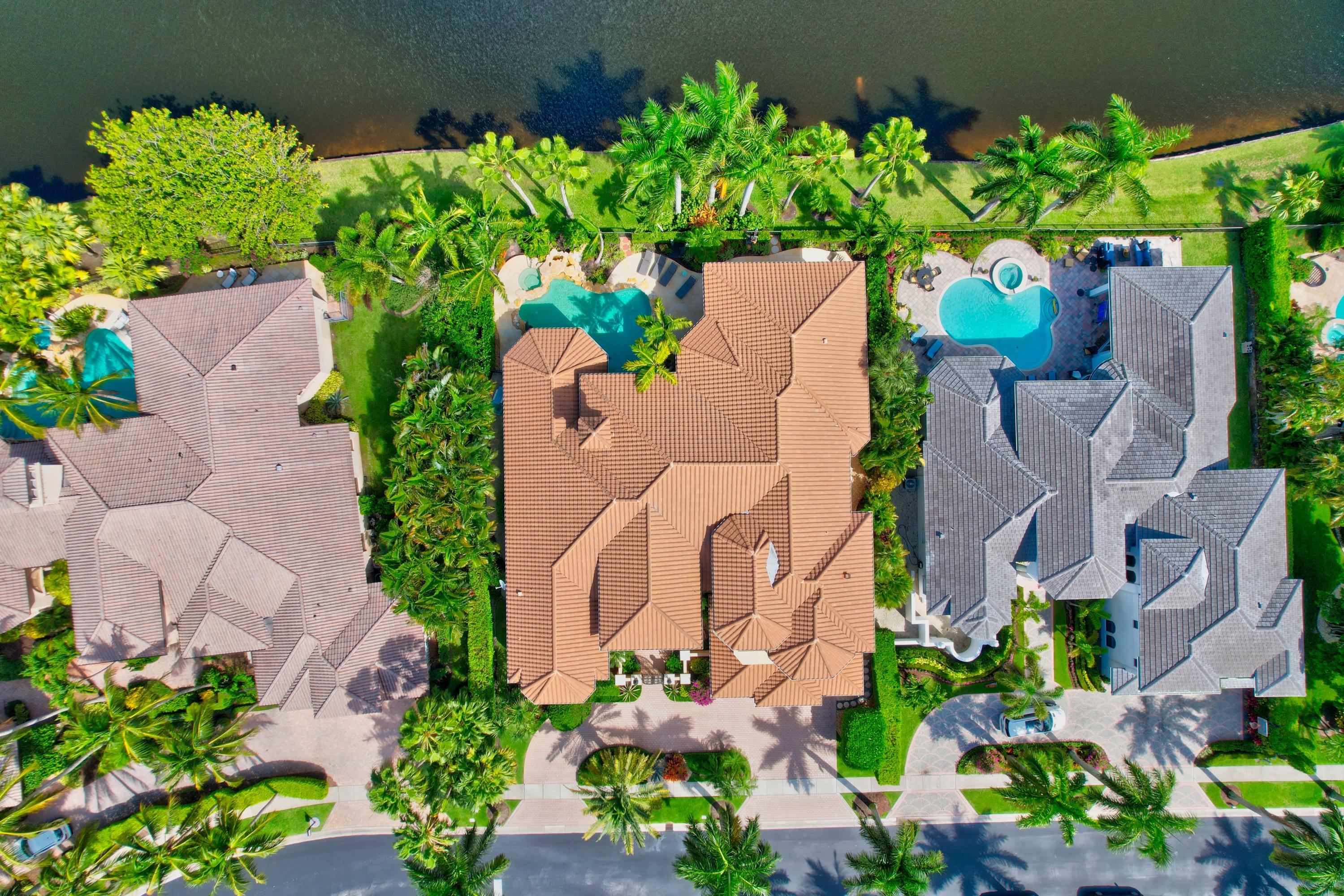 3811 Northwest Coventry Lane Boca Raton, FL 33496 - Photo 52 of 52 an aerial view of a house with a yard and garden