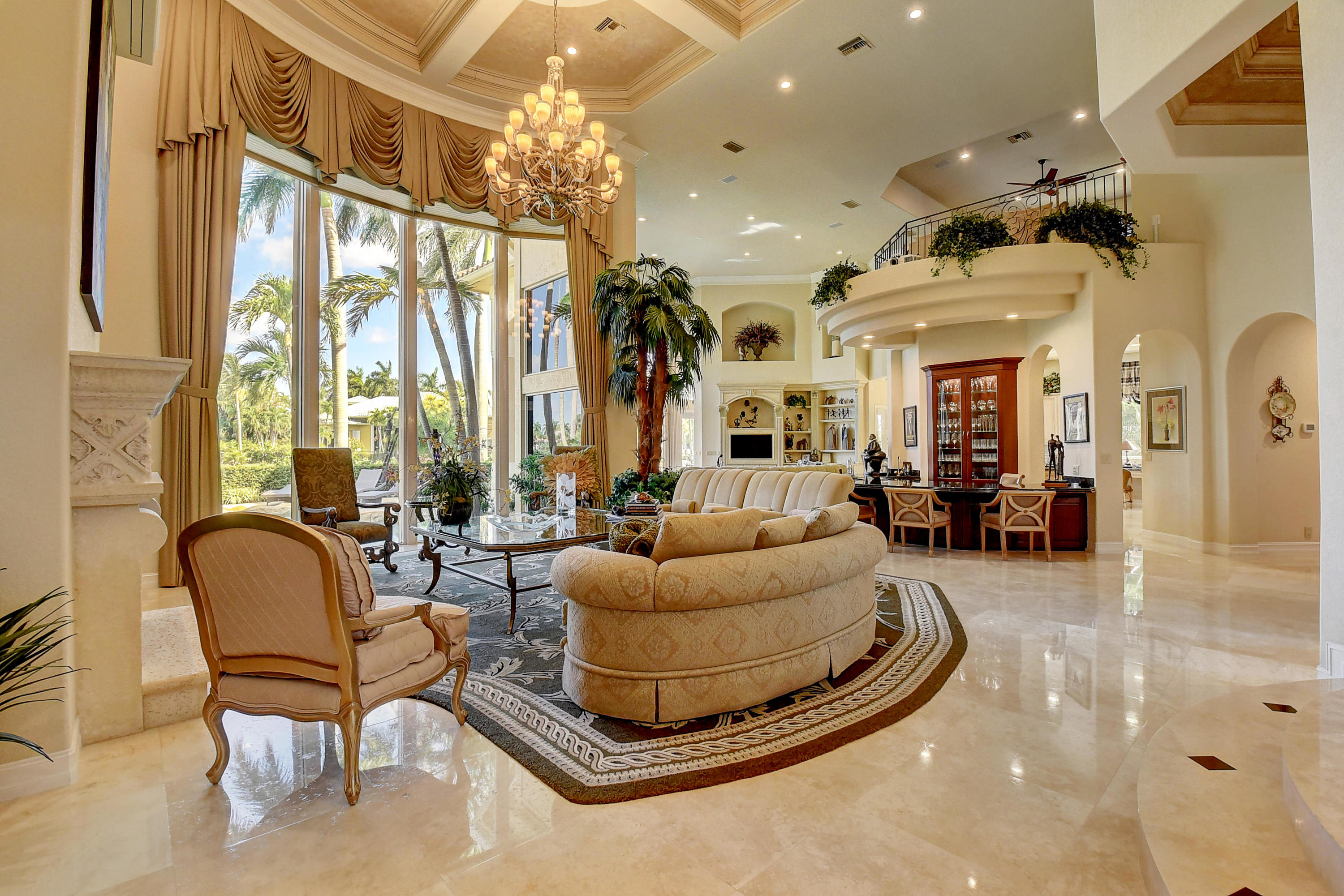 3811 Northwest Coventry Lane Boca Raton, FL 33496 - Photo 6 of 52 a living room with couches and a chandelier