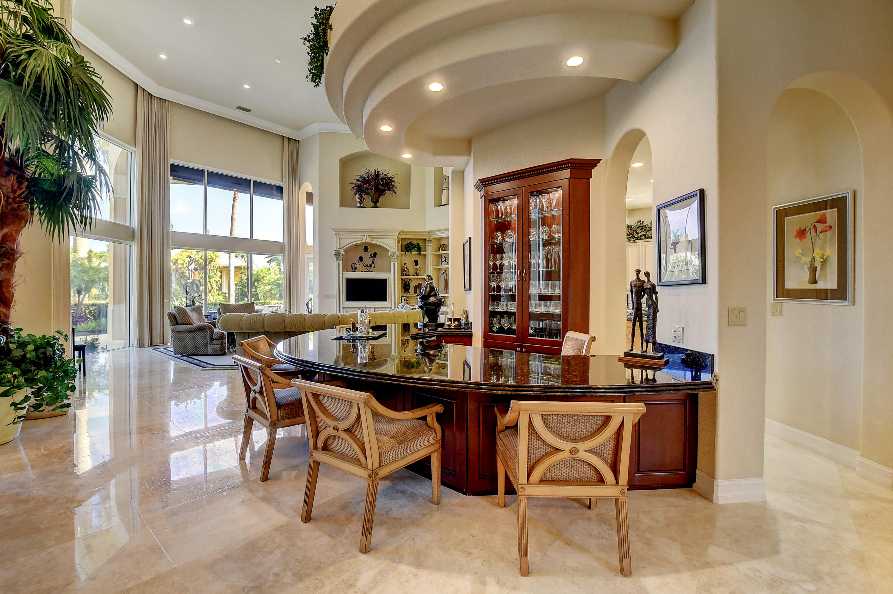 3811 Northwest Coventry Lane Boca Raton, FL 33496 - Photo 8 of 52 a view of a dining room with furniture