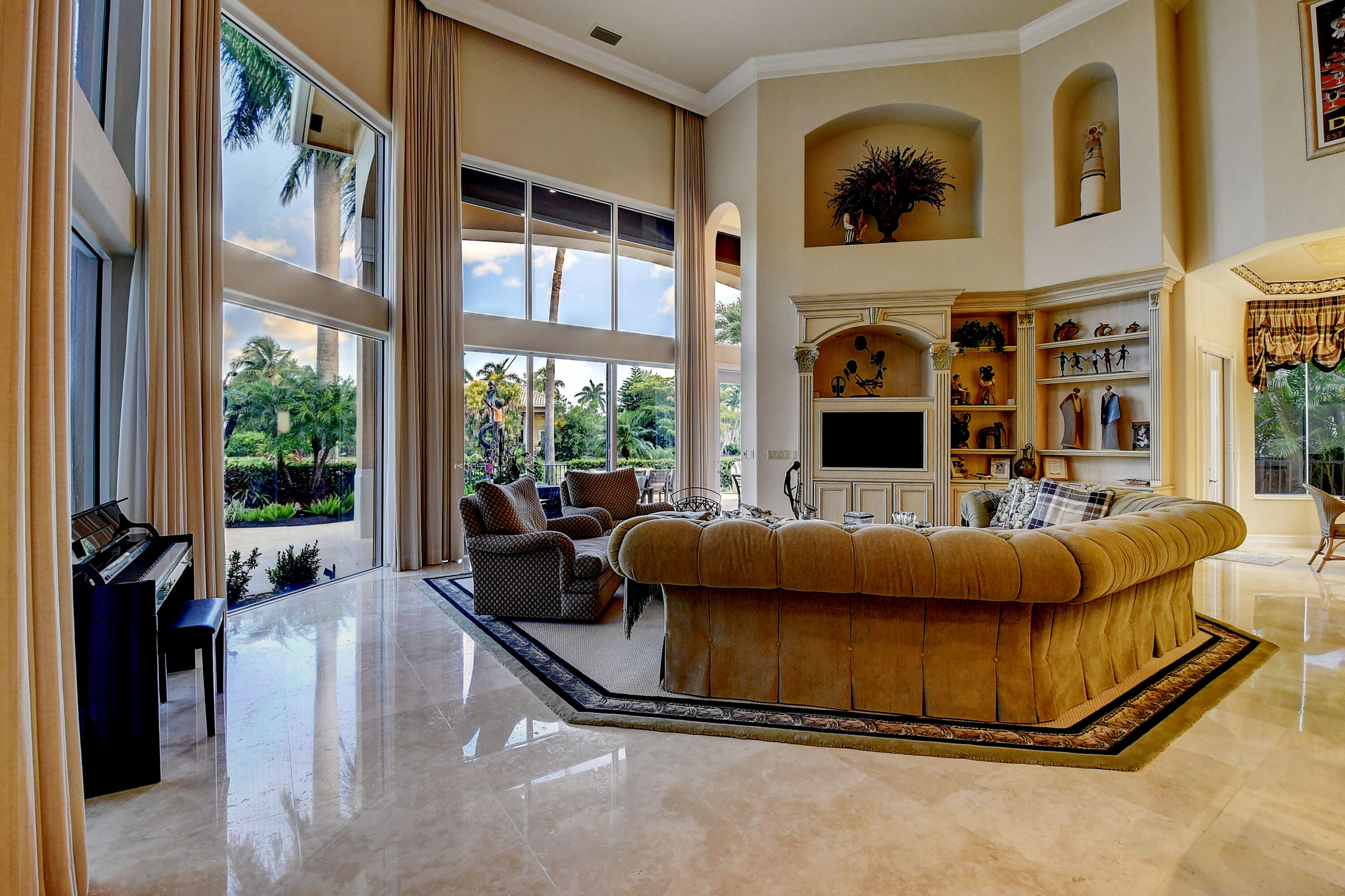 3811 Northwest Coventry Lane Boca Raton, FL 33496 - Photo 10 of 52 a living room with furniture and a fireplace