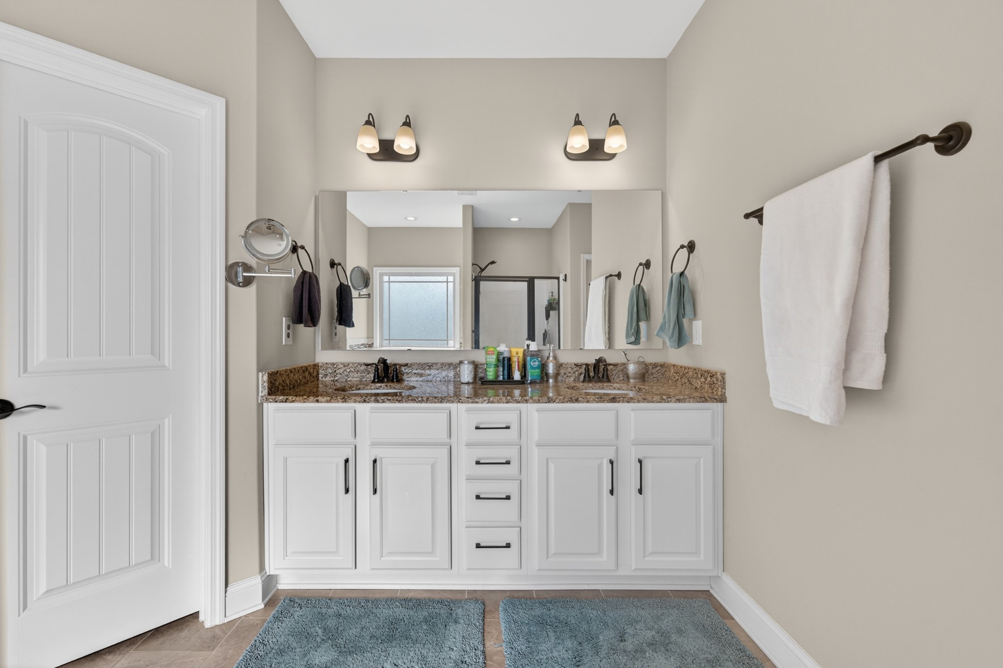 25 Knotting Hill Road Fayetteville, TN 37334 - Photo 27 of 49 a bathroom with a double vanity sink a mirror a vanity and a shower