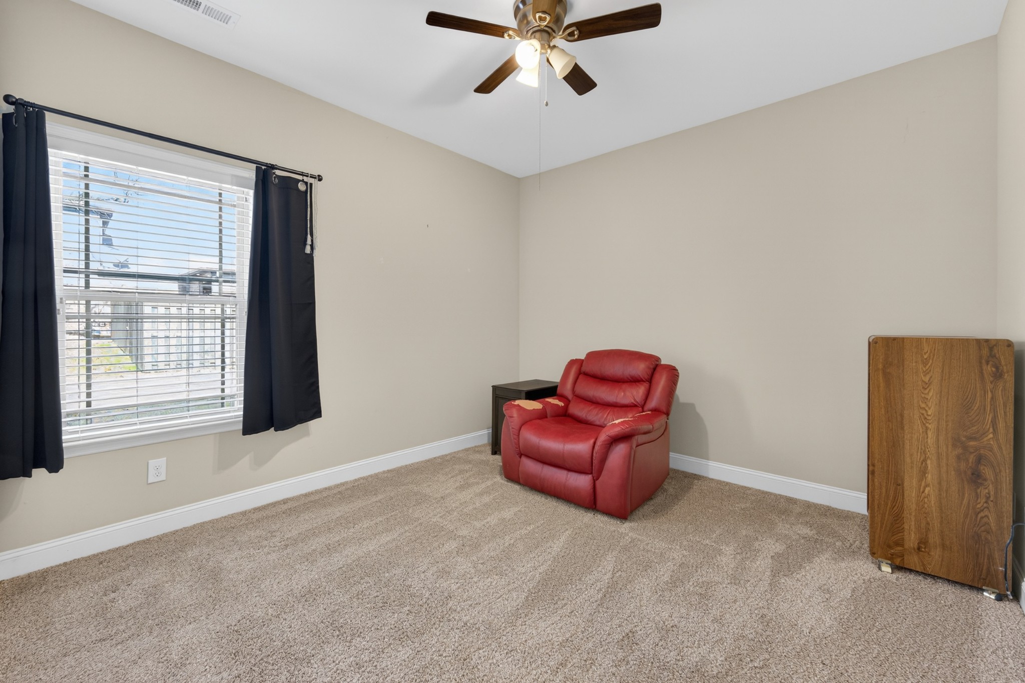25 Knotting Hill Road Fayetteville, TN 37334 - Photo 37 of 49 a view of a room with a cabinet and a ceiling fan
