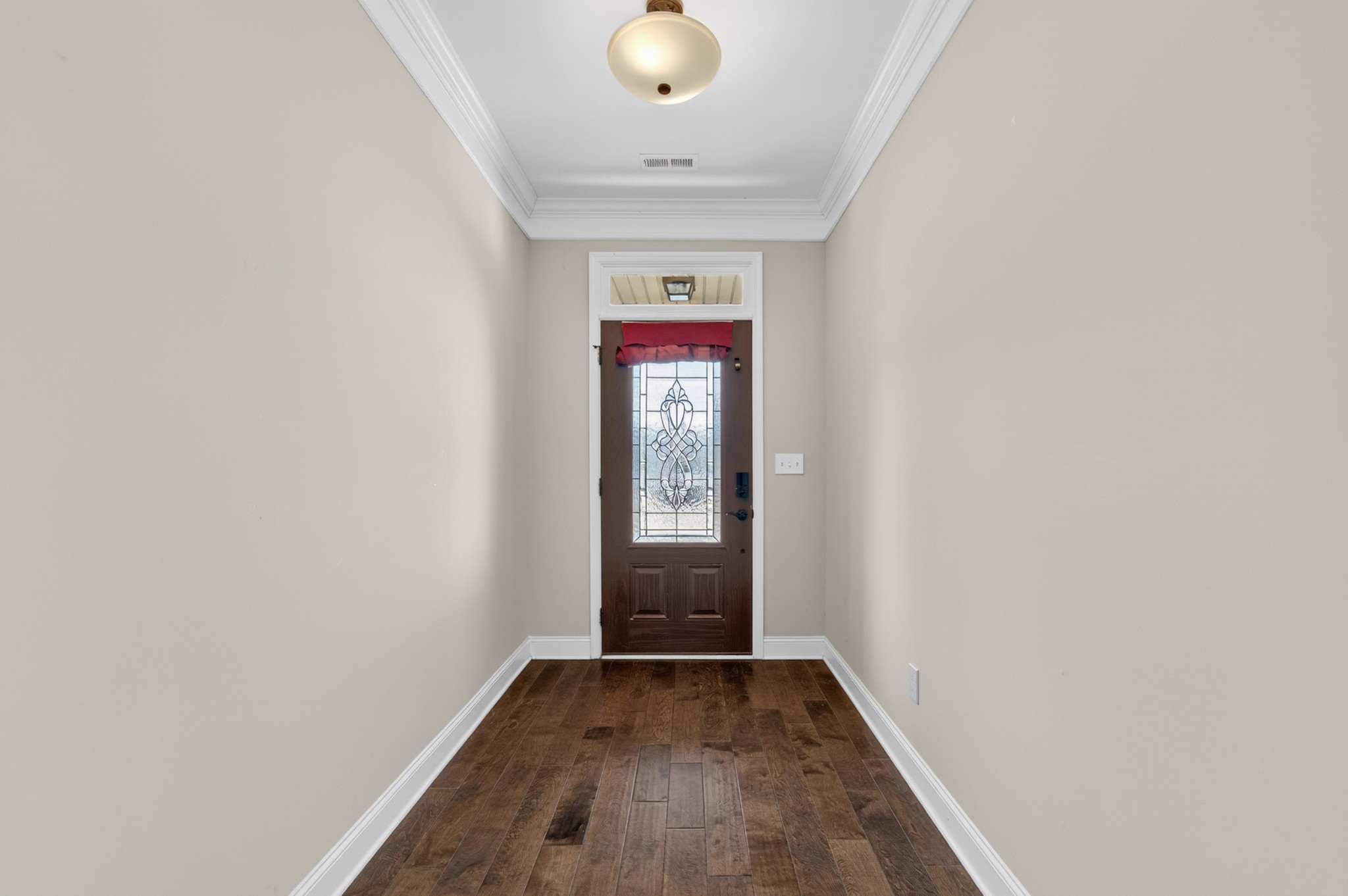 25 Knotting Hill Road Fayetteville, TN 37334 - Photo 8 of 49 a view of an empty room with window and wooden floor