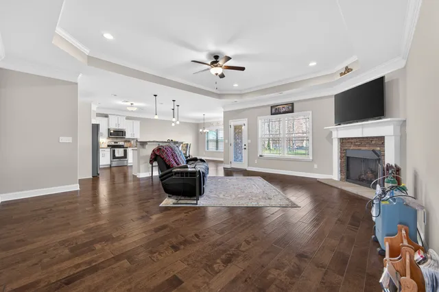 a living room with furniture or fireplace and a flat screen tv