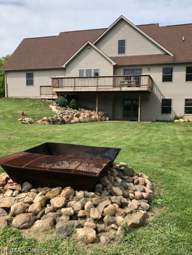 5765 Stanley Road Columbiaville, MI 48421 - Photo 33 of 40 stanley back yard.jpg