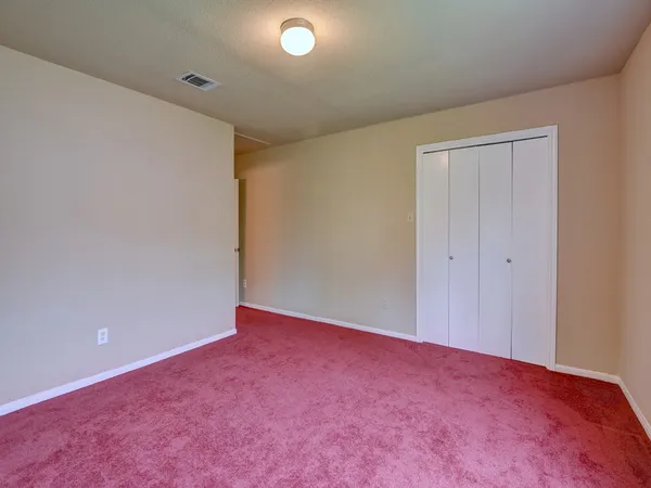 an empty room with an entryway