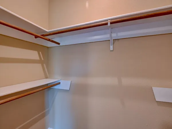 a view of a room with racks on the wall