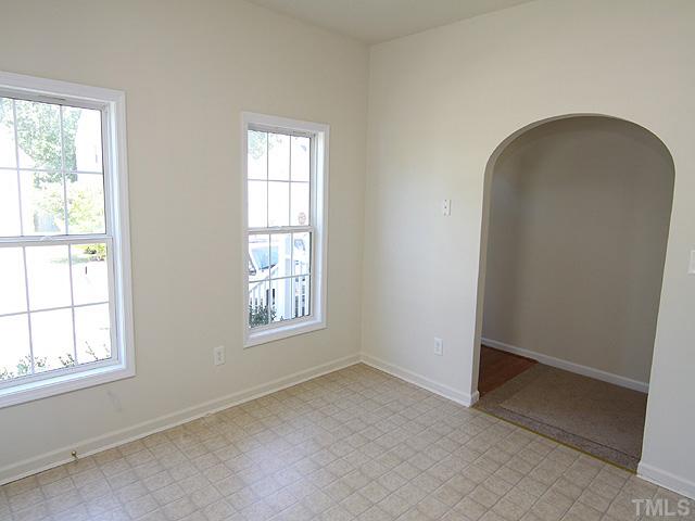 2141 Ramsgate Street Raleigh, NC 27603 - Photo 6 of 12 A very bright and open Kitchen to enjoy while you cook. An Arched doorway into the kitchen adds an especially nice touch.