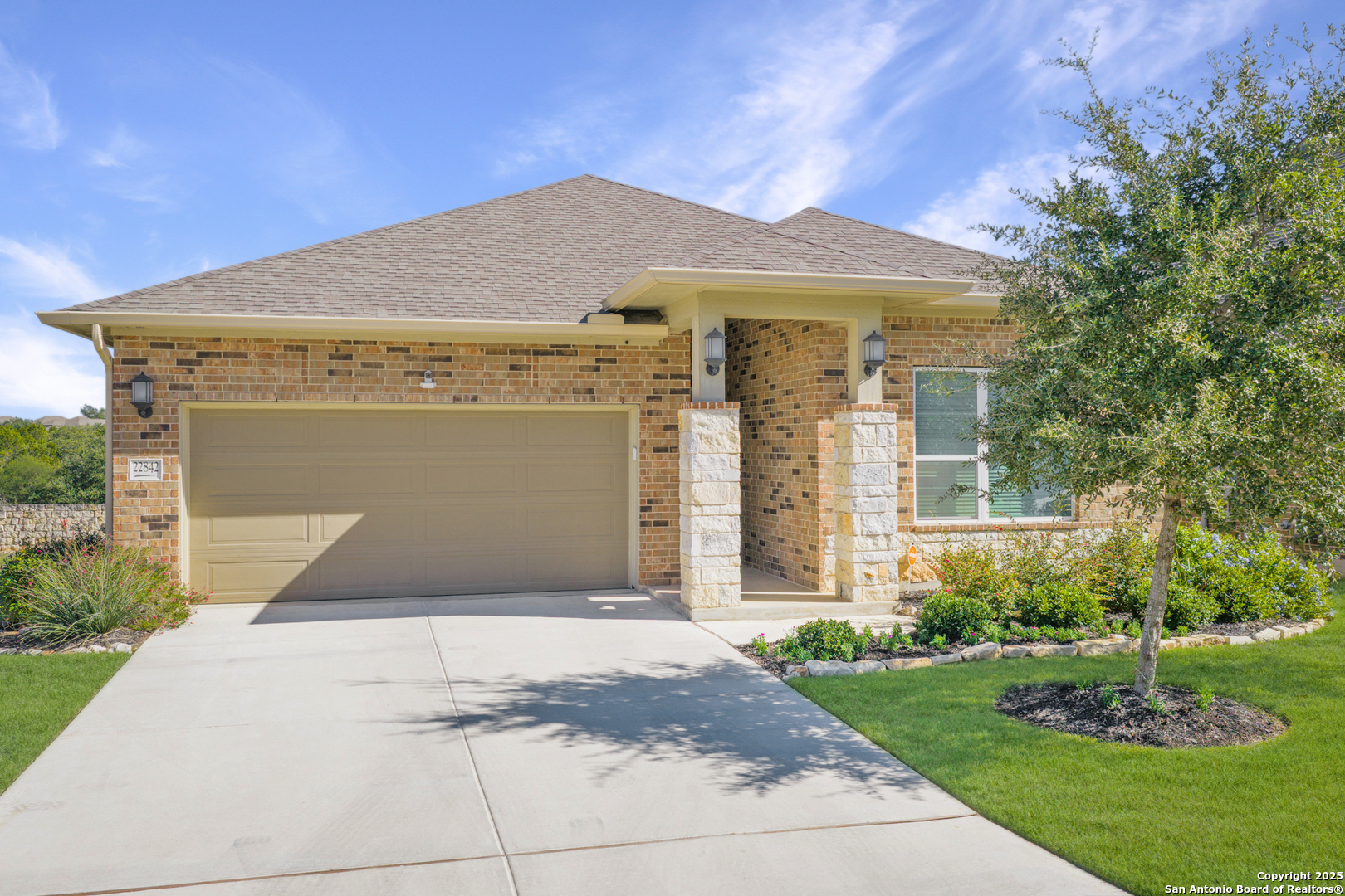 22842 Rio Salado San Antonio, TX 78261 - Photo 41 of 41 a front view of a house with a garden