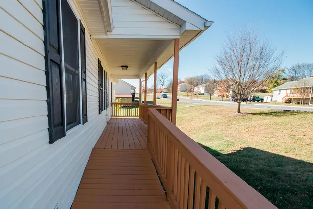 a view of swimming pool from a balcony