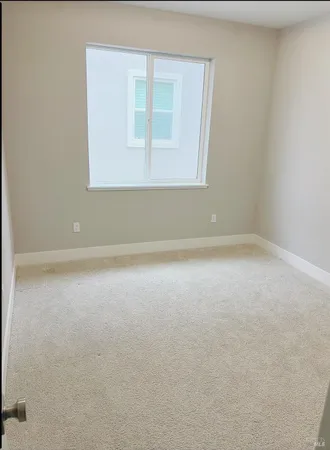 a view of a street with cars