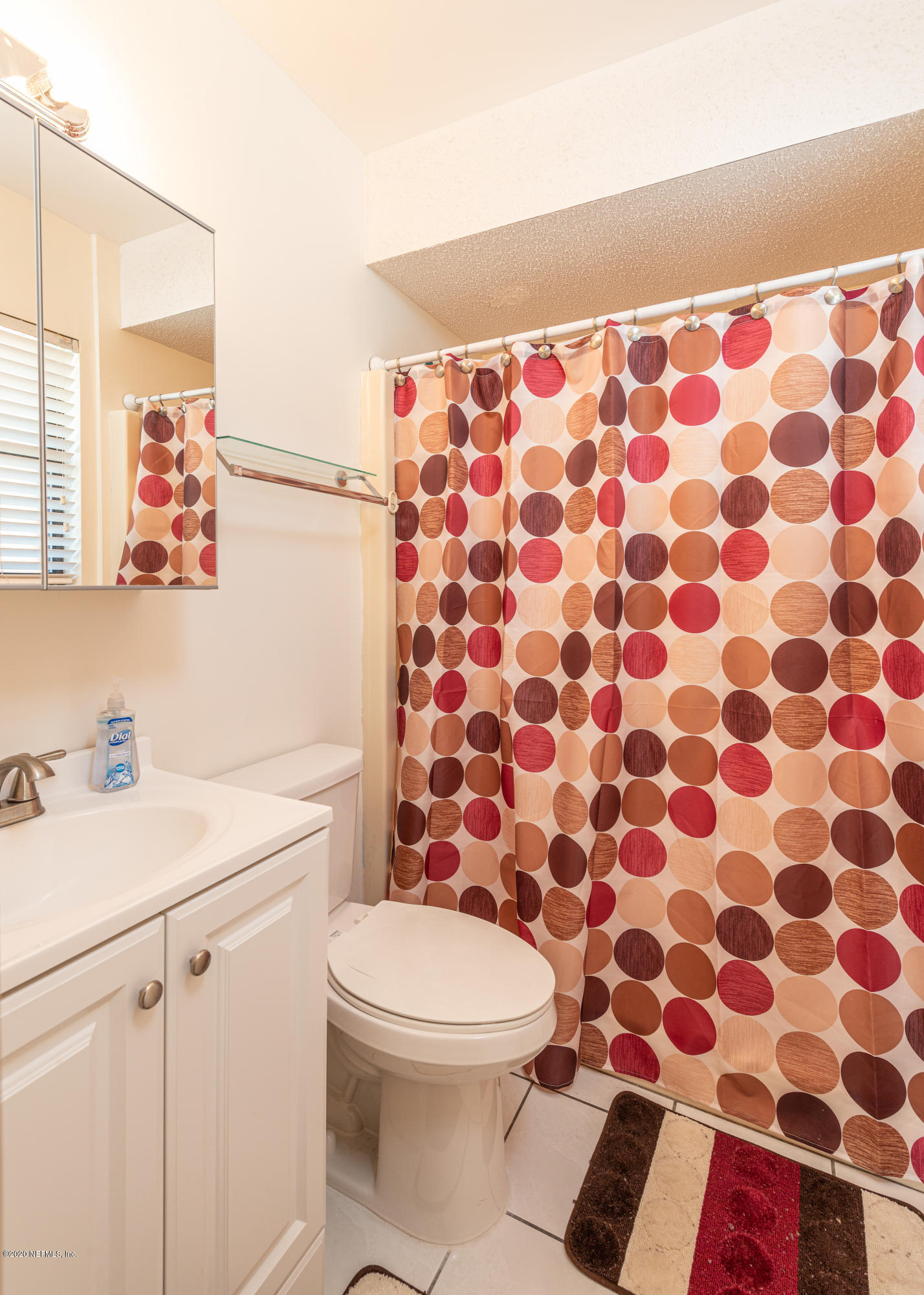 242 Jasmine Road St. Augustine, FL 32086 - Photo 12 of 26 a bathroom with a sink and a toilet