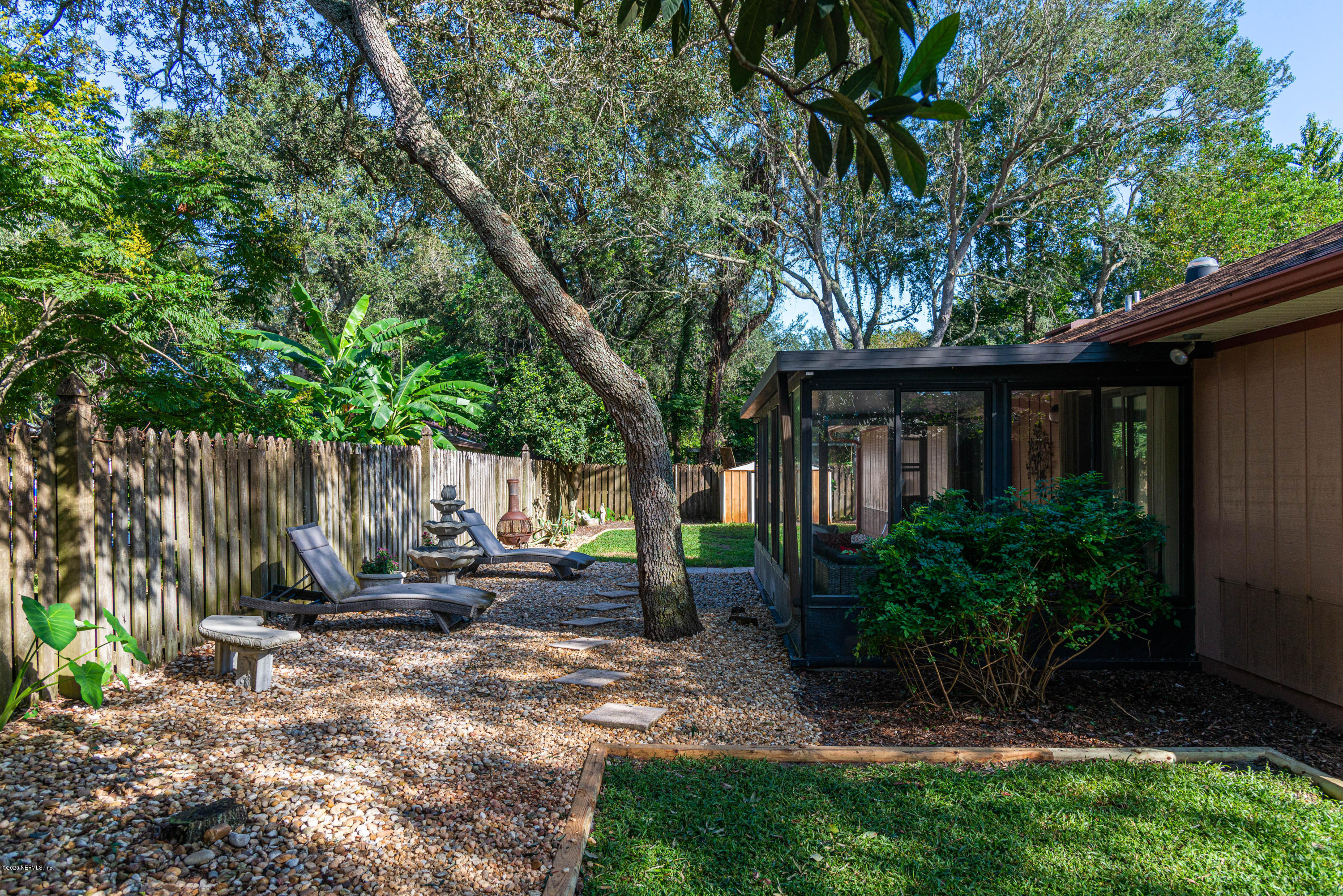 242 Jasmine Road St. Augustine, FL 32086 - Photo 26 of 26 a view of a house with backyard and sitting area
