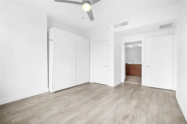 a bathroom with a shower and a toilet