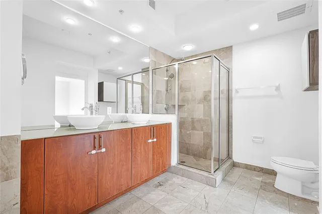 a room with gym equipment and a large window