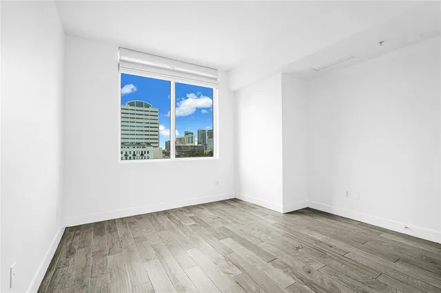 a living room with furniture pool and a table