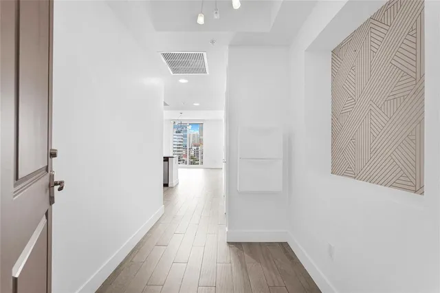 a kitchen with stainless steel appliances granite countertop a stove and a refrigerator