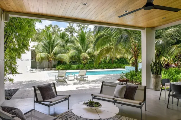a outdoor living space with furniture and garden view