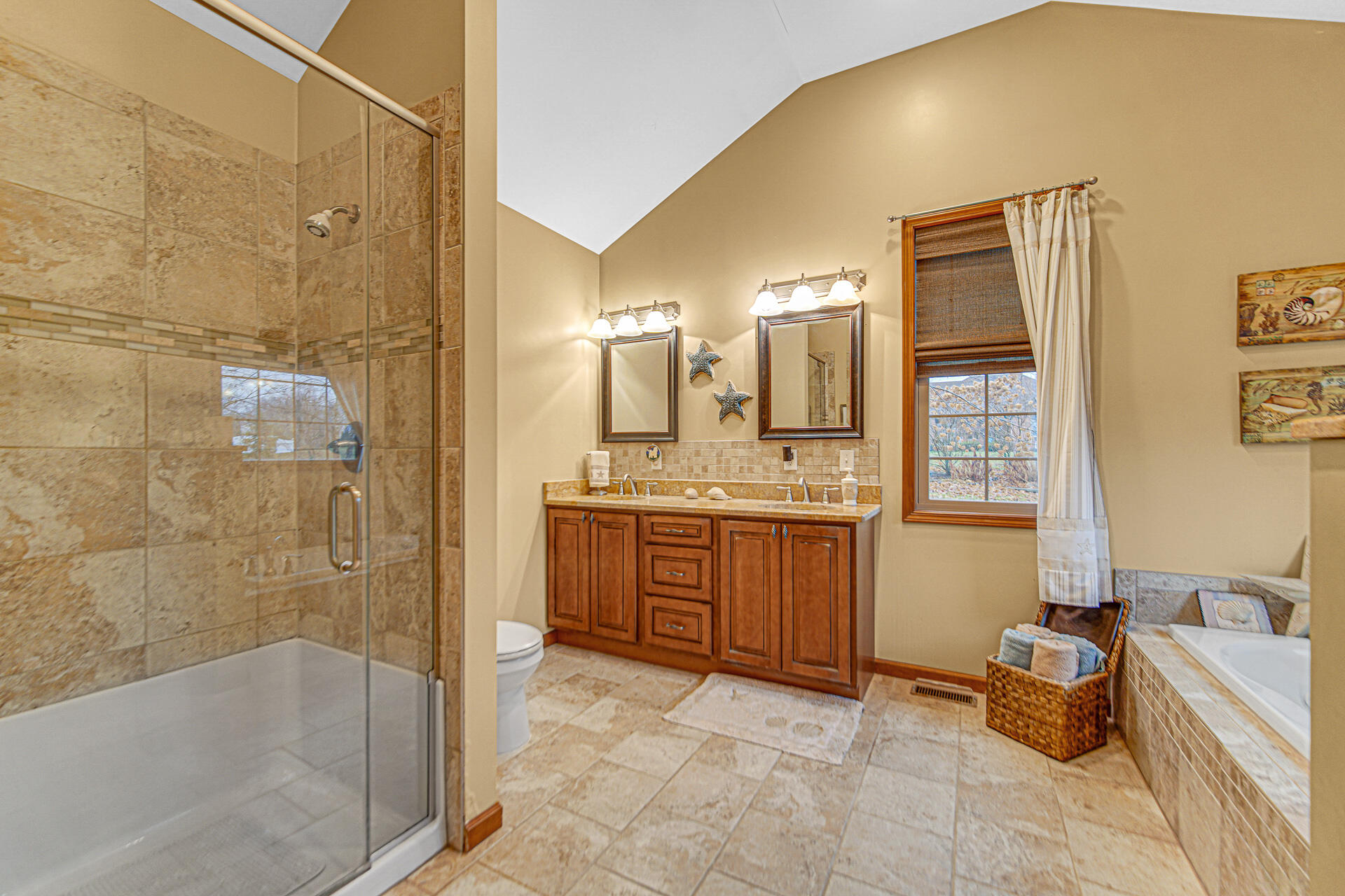 3252 Mockingbird Lane Valparaiso, IN 46383 - Photo 18 of 23 a bathroom with a granite countertop sink mirror and bathtub