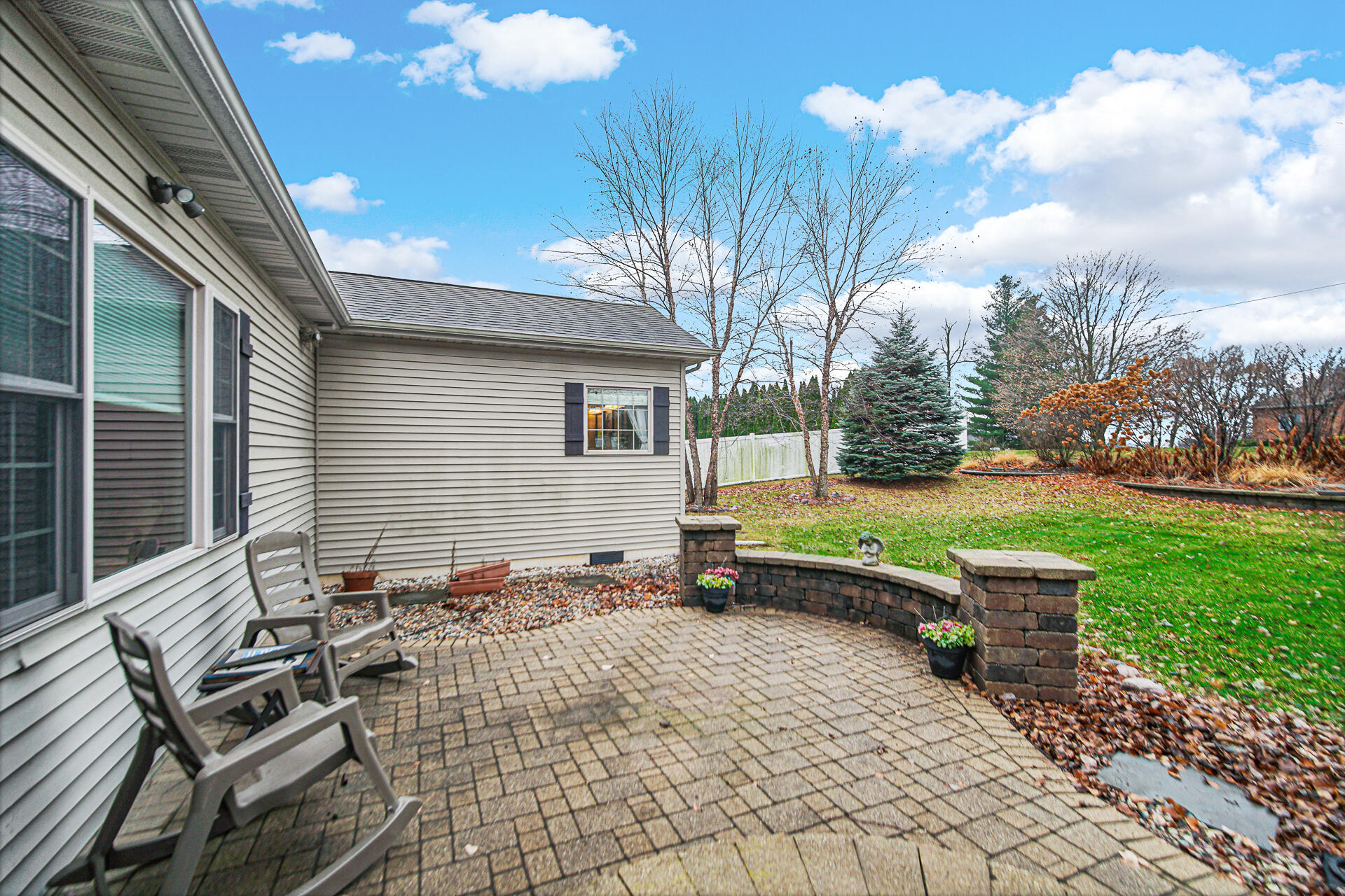 3252 Mockingbird Lane Valparaiso, IN 46383 - Photo 22 of 23 a backyard of a house with table and chairs