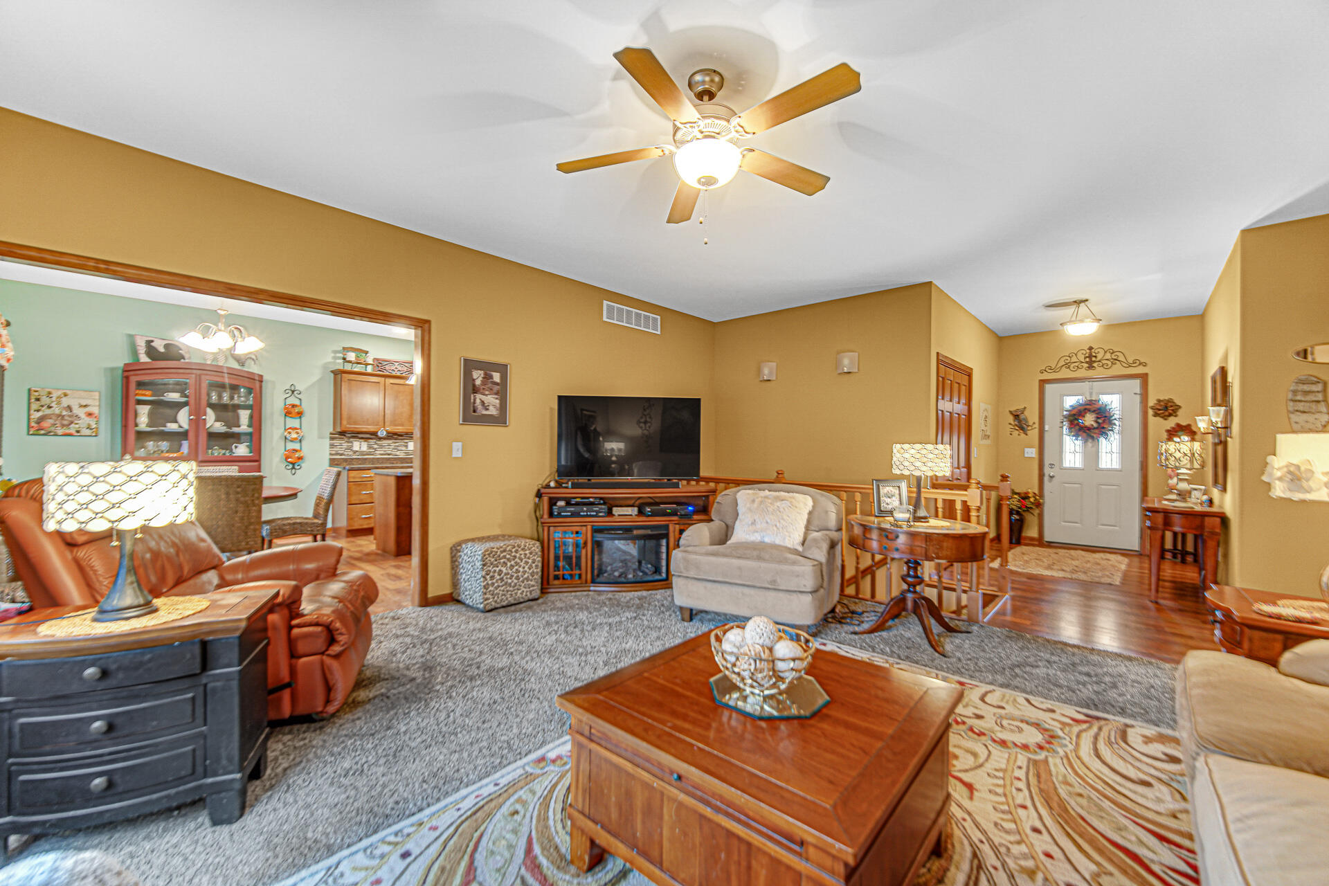 3252 Mockingbird Lane Valparaiso, IN 46383 - Photo 6 of 23 a living room with furniture kitchen view and a large window