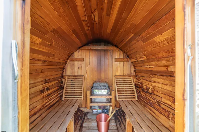 a view of a balcony with wooden floor