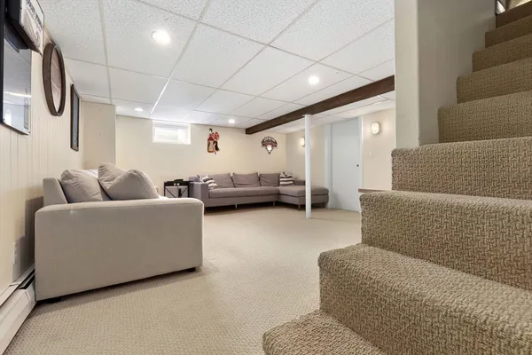 a living room with furniture and a couch