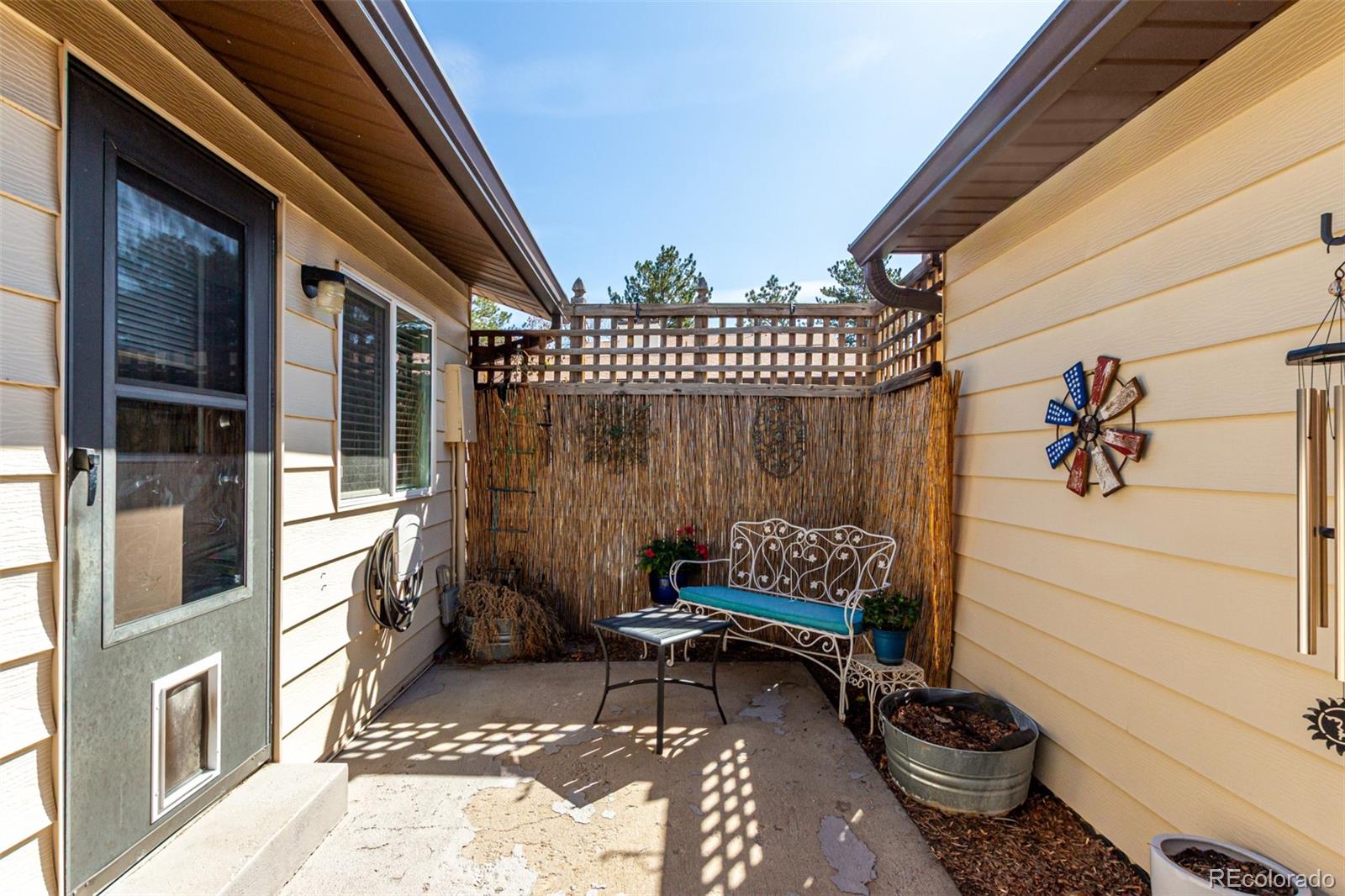 3657 South Laredo Street, Unit E Aurora, CO 80013 - Photo 14 of 20 a view of a chairs and table in the balcony