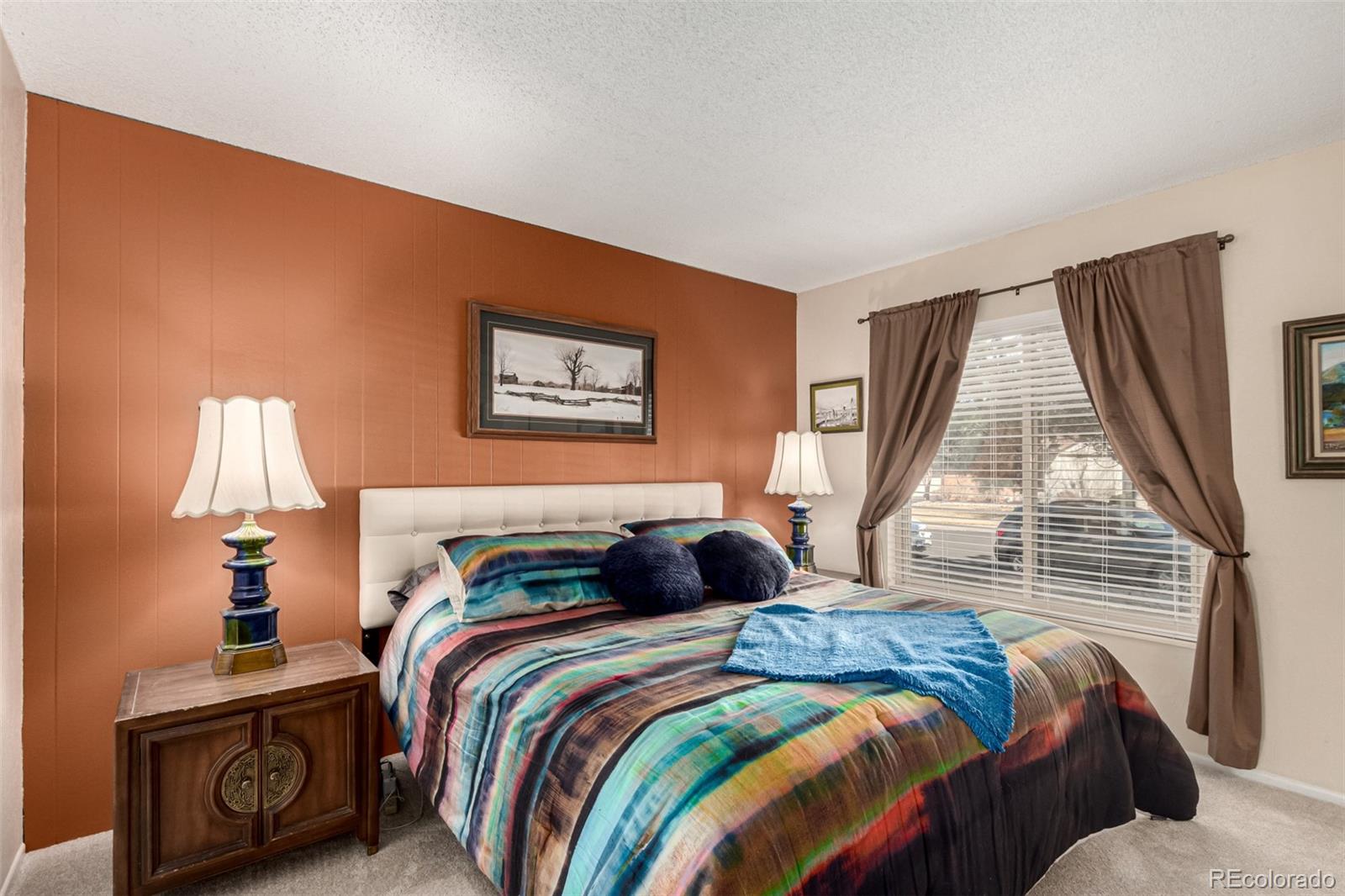 3657 South Laredo Street, Unit E Aurora, CO 80013 - Photo 9 of 20 a bedroom with a bed and a window