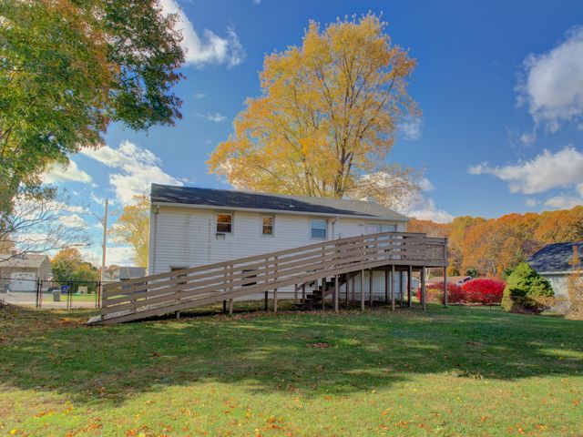 a view of a house with a big yard