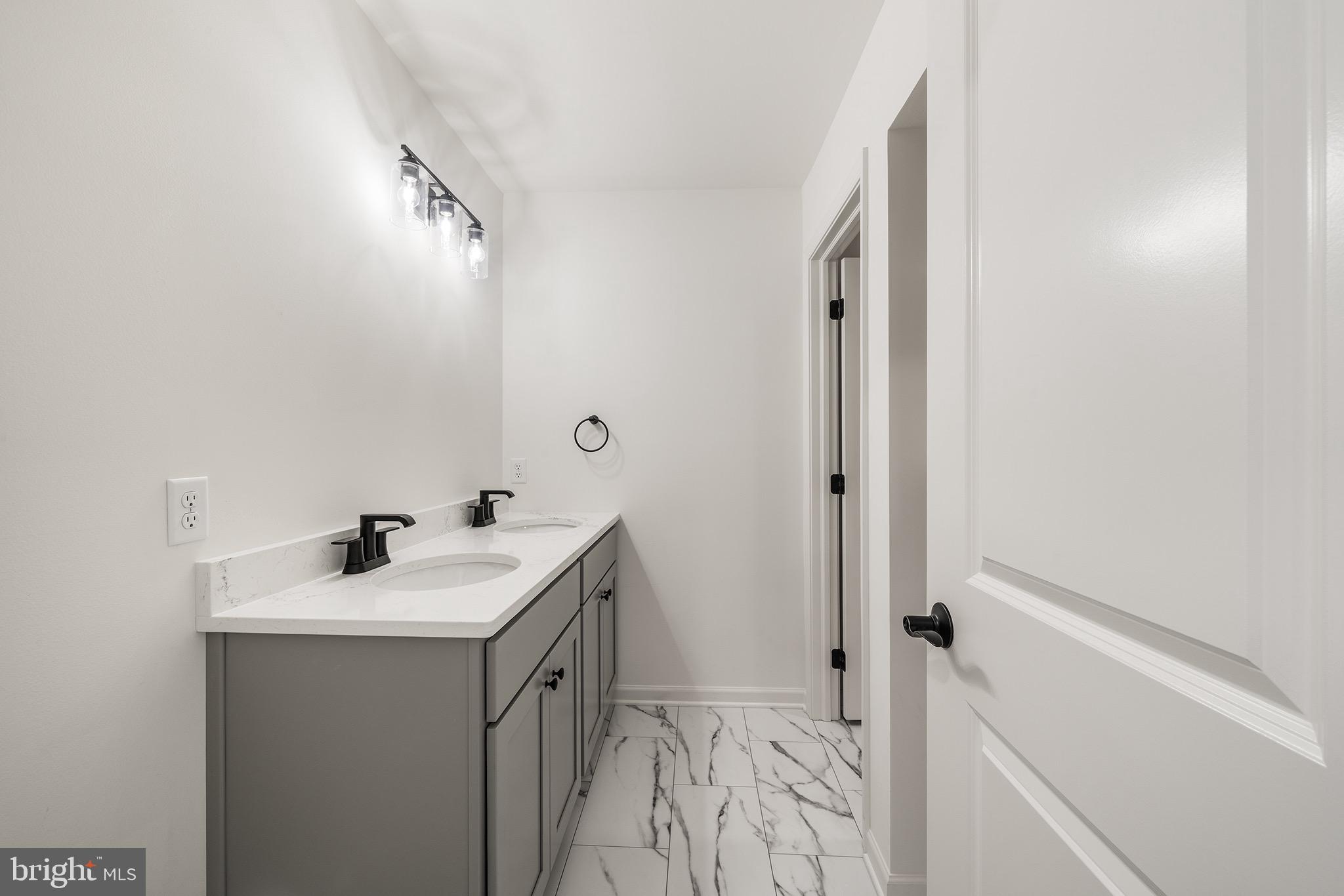 27 Lausch Road Denver, PA 17517 - Photo 35 of 43 a bathroom with a sink and a mirror