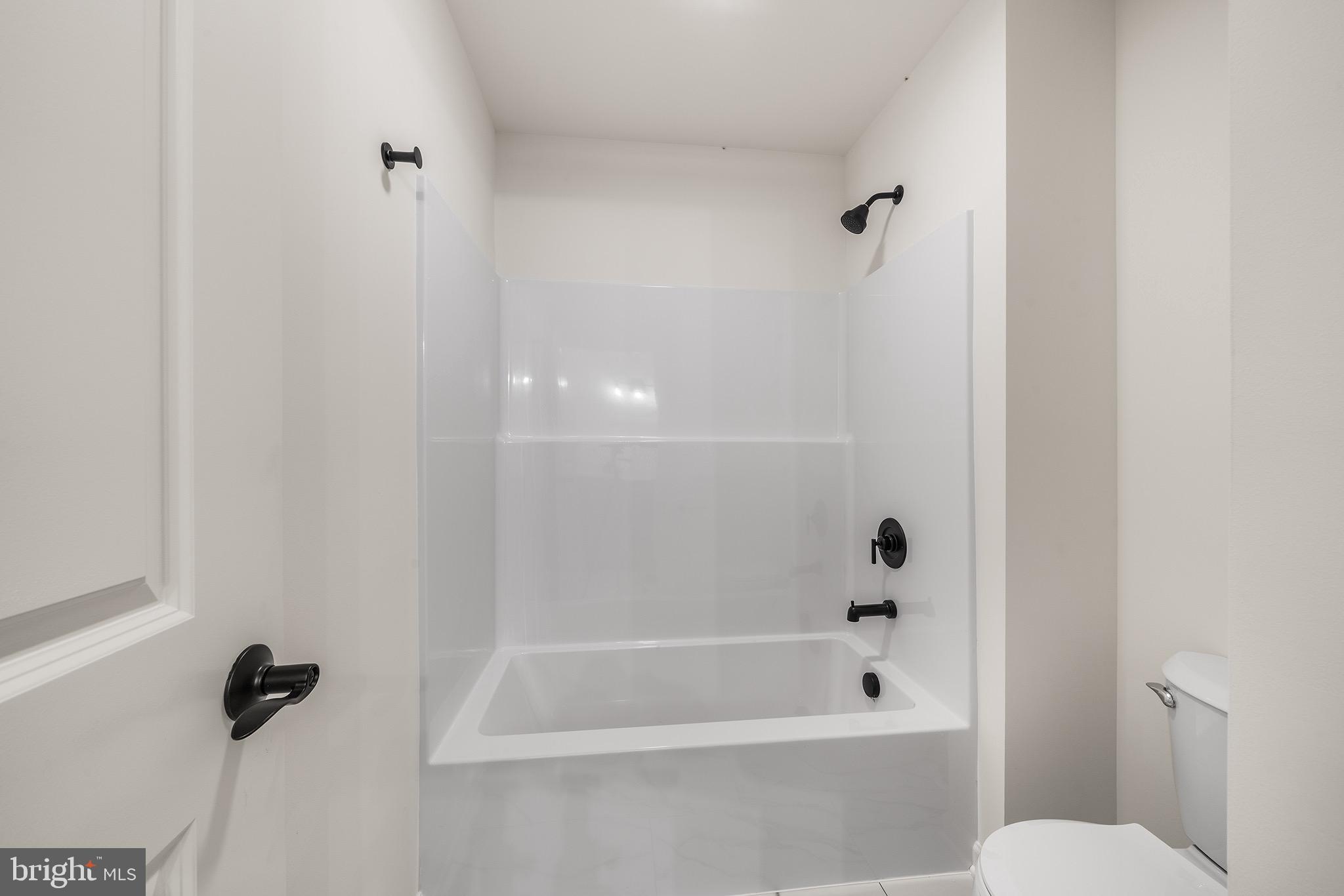 27 Lausch Road Denver, PA 17517 - Photo 36 of 43 a bathroom with a shower and a toilet