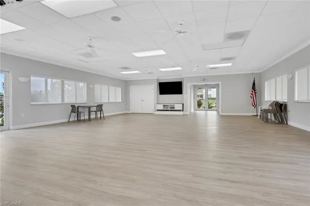 a view of kitchen with furniture and wooden floor