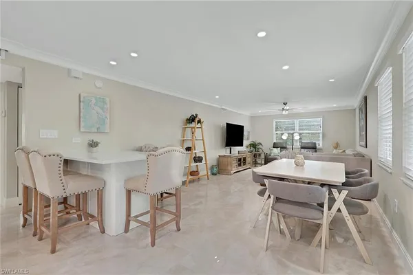 a view of a dining room with furniture