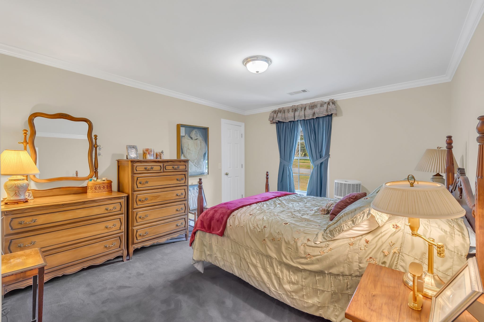 207 Sugar Tree Lane Pulaski, TN 38478 - Photo 28 of 30 a bedroom with a bed and cabinets