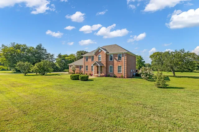 a view of a house with a big yard