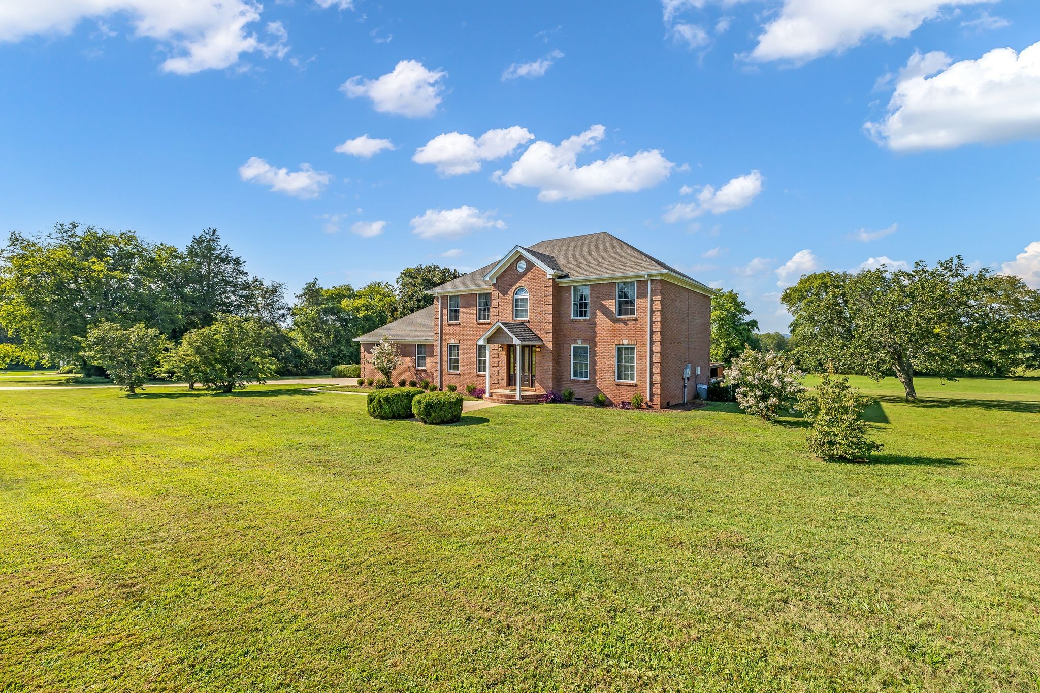 207 Sugar Tree Lane Pulaski, TN 38478 - Photo 3 of 30 a view of a house with a big yard