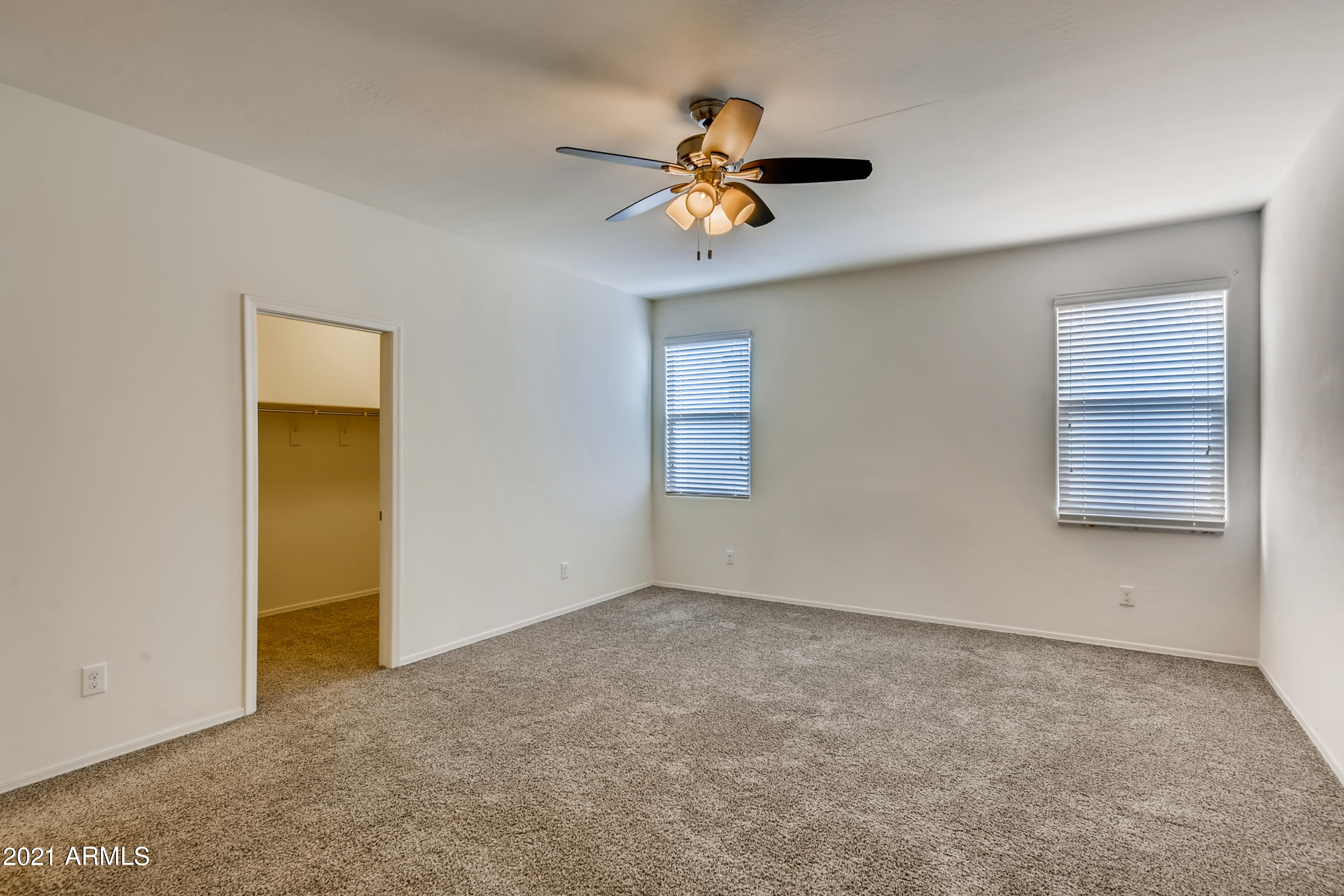 23807 West Chipman Road Buckeye, AZ 85326 - Photo 13 of 33 13-992301990-15 Primary Bedroom