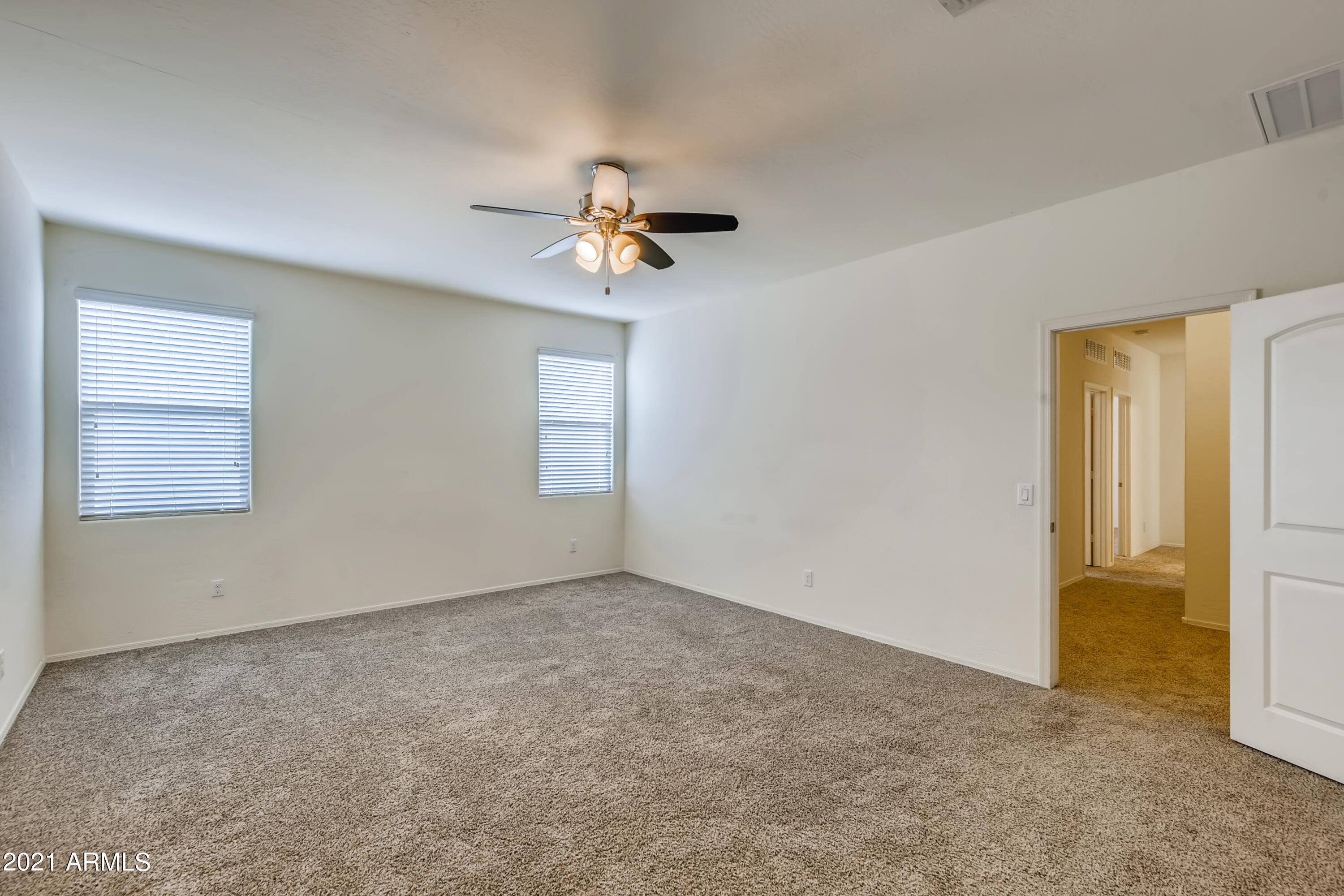 23807 West Chipman Road Buckeye, AZ 85326 - Photo 16 of 33 16-645603421-18 Primary Bedroom