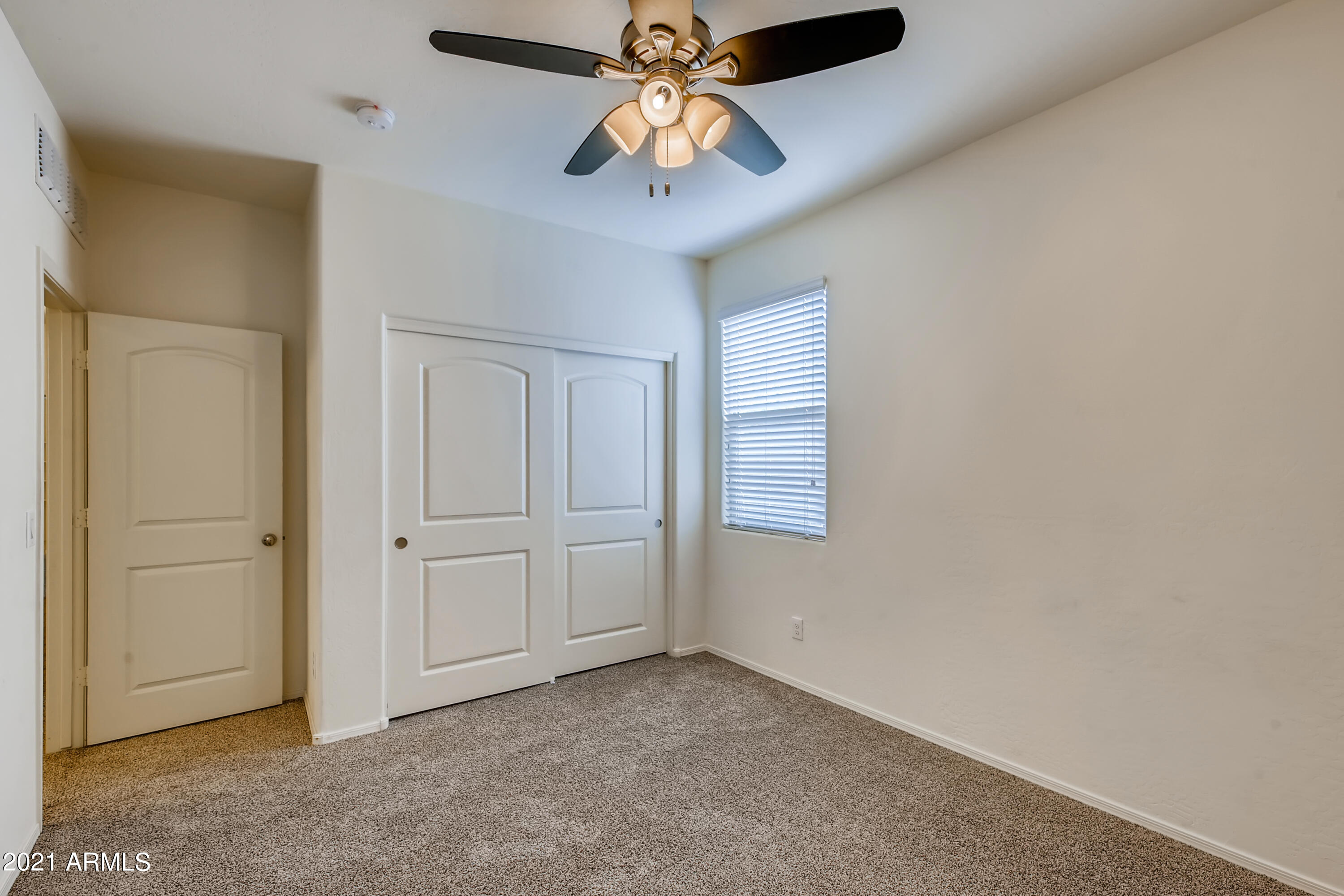 23807 West Chipman Road Buckeye, AZ 85326 - Photo 22 of 33 22-905660175-24 Bedroom